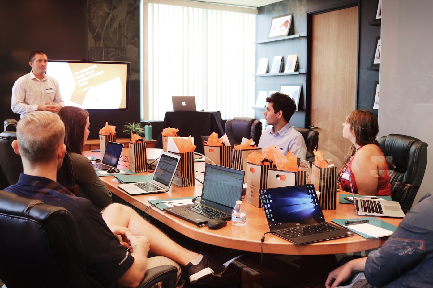 Team reviewing an analysis on screen